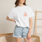 Lumi logo T-shirt | Small orange heart logo tee